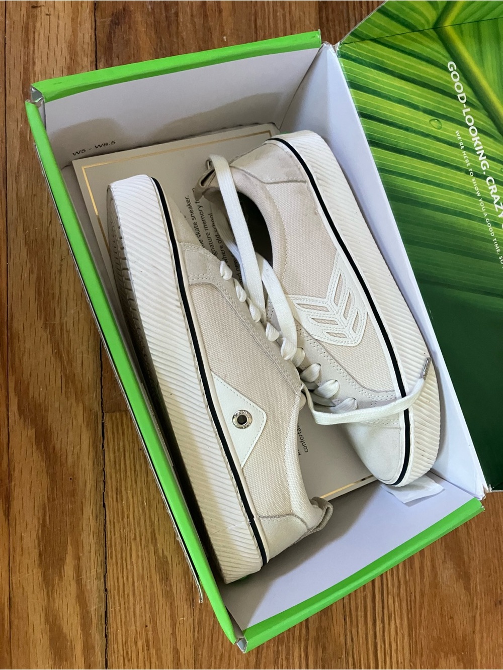 Cariuma White Canvas Sneakers with Black Trim
